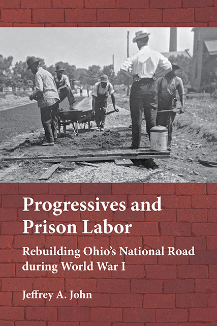 Cover shows a black and white photo showing prison laborers working on the road against a background of bricks.