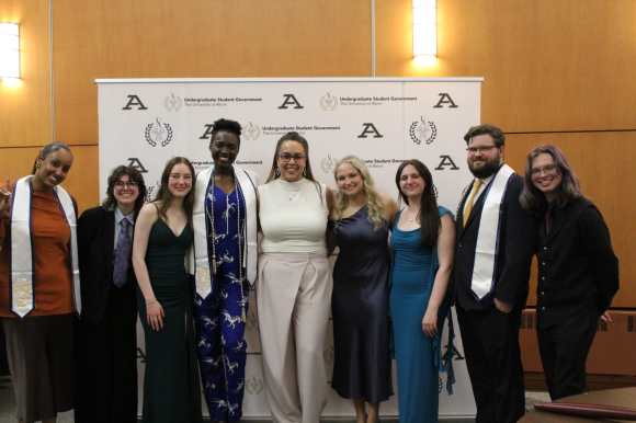 Members of the Directional Leadership Team posing with USG's Advisor at our End of Year Awards